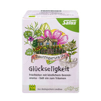 Hierba seca de SalusFlora Glückseligkeit Felicidad en una bolsa, con hojas verdes y flores secas para infusión natural.
