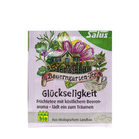 Imagen de la caja de Glückseligkeit Felicidad de SalusFlora, con diseño colorido y texto en el envase del producto natural.