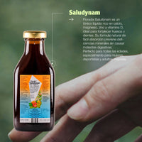 Botella de Saludynam 250 ml de SalusFlora, con líquido saludable en envase transparente y etiqueta visible.